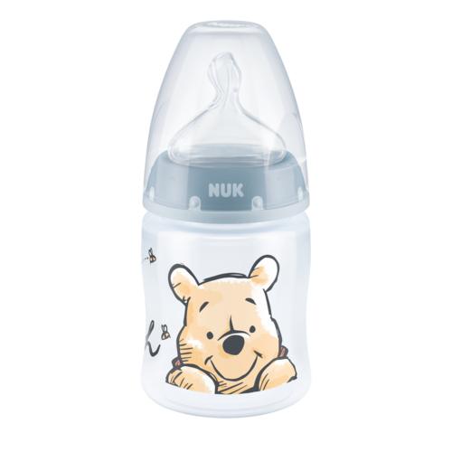 Miniaturka artykułu - NUK First Choice+ Kubuś Puchatek Butelka ze wskaźnikiem temperatury ze smoczkiem silikonowym 0-6m M niebieska 150ml