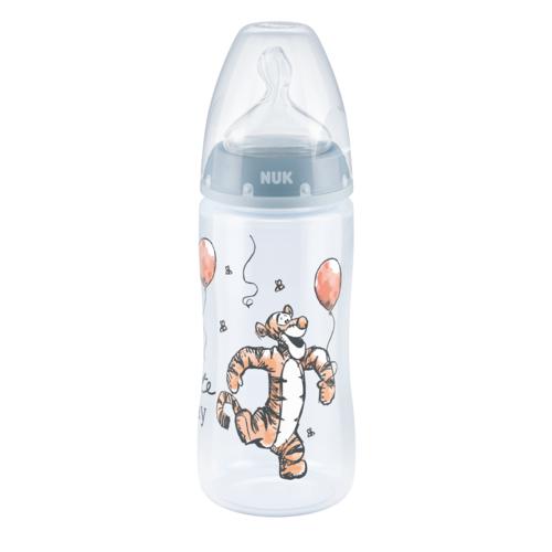 Miniaturka artykułu - NUK First Choice+ Kubuś Puchatek Butelka ze wskaźnikiem temperatury ze smoczkiem silikonowym 0-6m M niebieska, 300ml	