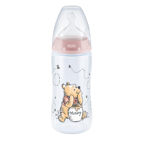Miniaturka artykułu - NUK First Choice+ Kubuś Puchatek Butelka ze wskaźnikiem temperatury ze smoczkiem silikonowym 0-6m M r&oacute;żowa, 300ml